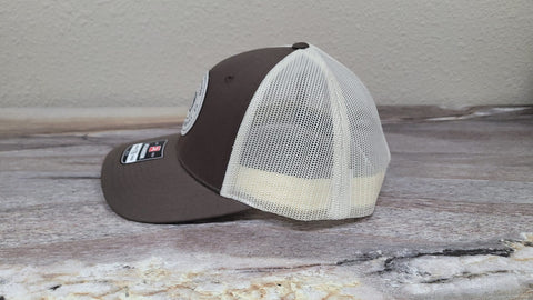 dark canyon trucker hat coffee and khaki with white and black faux leather patch left side