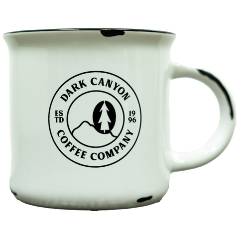 Ceramic 10 oz white mug with circle dark canyon coffee logo