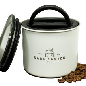 dark canyon coffee white half pound airscape container open with lid and beans