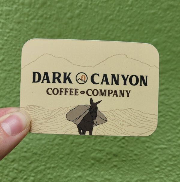 dark canyon coffee horizontal logo with mountains and donkey 3 inch by 2 inch matte sticker