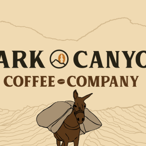 dark canyon coffee horizontal logo with mountains and donkey 3 inch by 2 inch matte sticker