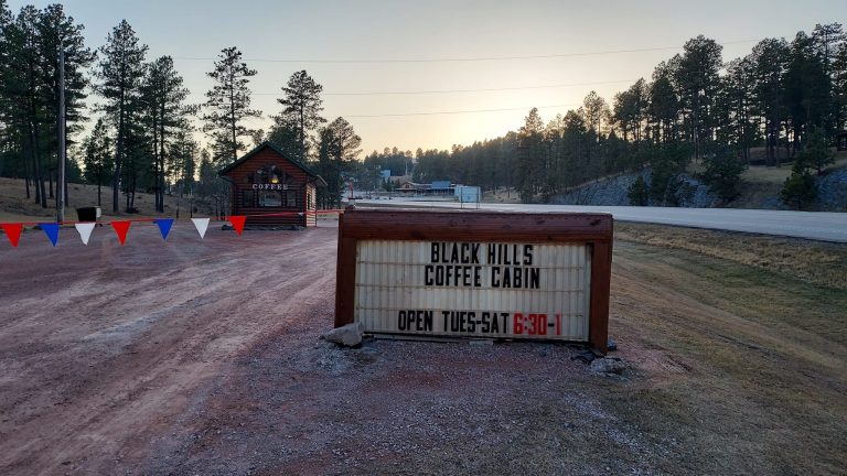 black hills coffee cabin sign and building 768x432