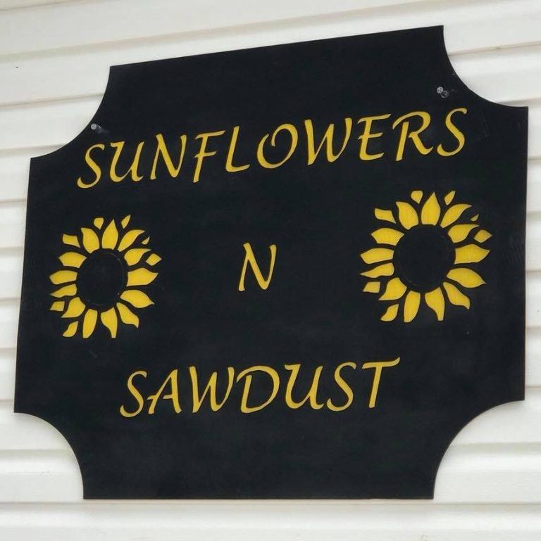 sunflowers n sawdust sign 768x769