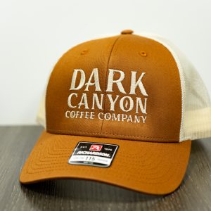 pumpkin and khaki colored Richardson snapback trucker hat Front with vertical stack alternative dark canyon coffee logo