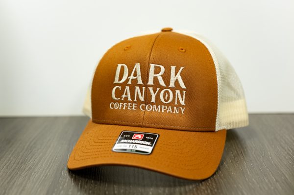 pumpkin and khaki colored Richardson snapback trucker hat Front with vertical stack alternative dark canyon coffee logo