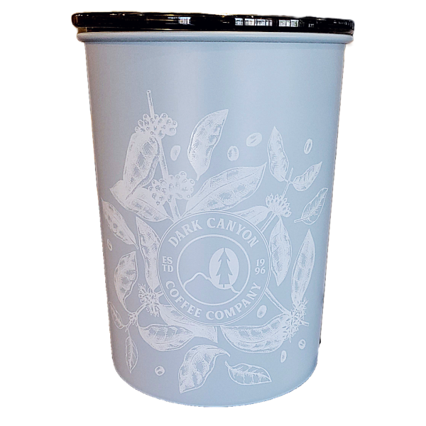 light blue one pound airscape coffee canister with white printed coffee plant design and circle dark canyon coffee logo