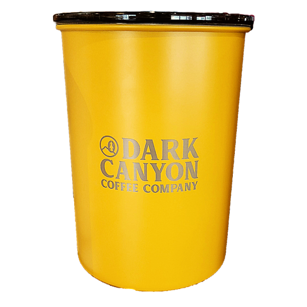 yellow one pound ariscape coffee canister with dark canyon logo engraved